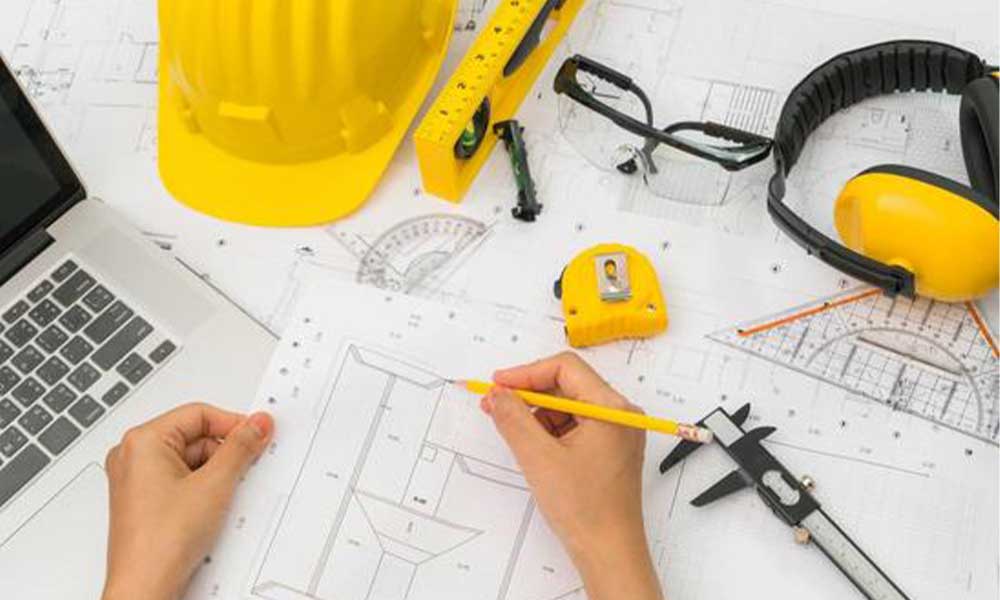 plan de travail avec des plans de construction vu d'en haut